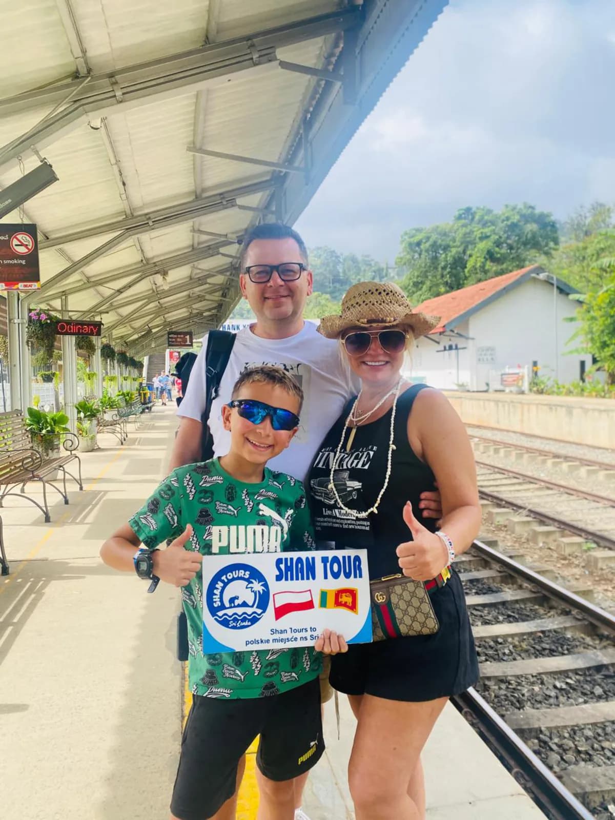 A family setting off from a hill-country railway station